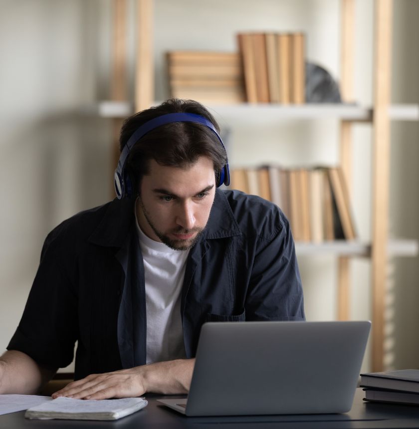 An illustration of a student and tutor engaging in a one-on-one online lesson via Zoom, with study materials and a Notion page on the screen.